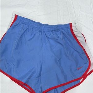 Nike Women's Blue Shorts with Red Accents